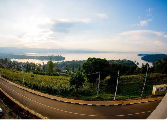 Scenic road overlooking Lake Kivu, AI generated