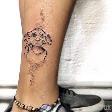 These Harry Potter Tattoos Will Cast Lumos On Your Ideas Mix Ping Harry Potter Dovmeleri Bacak Dovmeleri Sirt Dovmeleri