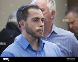 Christopher Calvin Garnier, charged with second-degree murder in the death  of Truro police officer Const. Catherine Campbell, arrives at Nova Supreme  Court for the start of his trial in Halifax