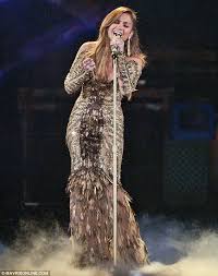 Reunited Jennifer Lopez And Marc Anthony Share Several Tender Moments As She Takes The Stage In Barely There Outfit Jennifer Lopez Jenifer Lopez Couture Dresses