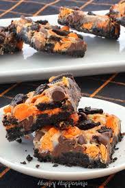 Orange And Black Cookies And Cream Halloween Magic Bars Recipe Halloween Food Treats Cookies And Cream Oreo Cookie Dessert
