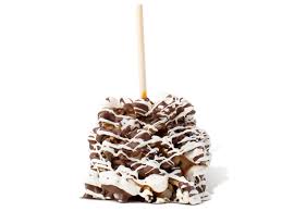 Two chocolate covered caramel apples with toasted pecans and almonds packed specially for warm weather shipping in an insulated box with ice packs to ensure perfect arrival. Caramel Apple Rocky Road