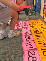 get your students up and moving with a 120 number chart