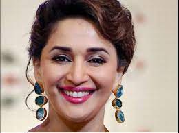 Madhuri dixit was the grand marshall for india day parade in nyc for 2002, i think. Babushahi Com