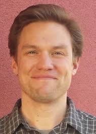 Economic Viability and Environmental Impact of In-Motion Wireless Power  Transfer