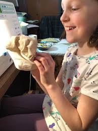 Rosie is making herself at home in Mommy's pregnancy pillow.