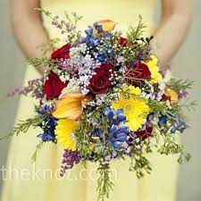 {sarah's bouquet details} this bright bouquet via onewed features the perfect combination of: Bold Bridesmaid Bouquets Red Wedding Flowers Blue Wedding Flowers Purple Wedding Theme