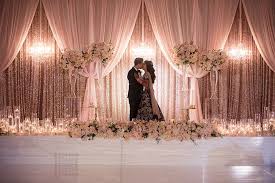 Lavish Traditional Indian Wedding Strictly Weddings Indian Wedding Flowers Wedding Stage Backdrop Traditional Indian Wedding