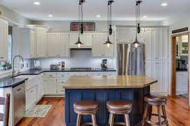 The backsplash is brown tones with some gray. Blue Kitchen Ideas Cabinets Walls And Counters