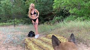Inked Latina influencer fucks her dog on the beach