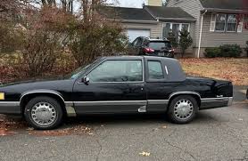 Image result for Black Sapphire 1993 Cadillac