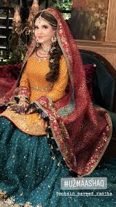 Mehndi Bride If You Are Wearing Yellow On Mehndi Then Wear Orange Or Pastel Colors On Ma Pakistani Mehndi Dress Pakistani Bridal Dresses Bridal Dress Fashion