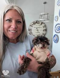 I love this page because all the dogs make me smile and warm my heart.  Here's my family, Warlock and Willow. Willow is waving hello. I hope my  picture makes you all