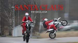 Santa is always a popular character and kids especially love it because it reminds them of toys they will be getting from santa on more inflatable santa claus on a bike. Supermoto Christmas Santa Claus Doing Wheelies On Motorcycles Ntk Edit Youtube