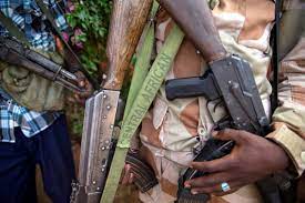 PRINT An armed fighter belonging to the 3R armed militia displays his  weapon in the town of Koui, Central African Republic - Religion News Service