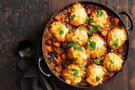 Classic Beef And Red Wine Stew With Cheesy Dumplings Recipe Recipes Beef Recipes Dumplings