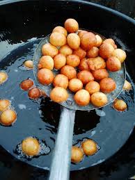 Little tips to getting a perfect puff puff 1. Always mix your batter to the right texture. Do not add too much water when mixing, because as it's rising, the batter is