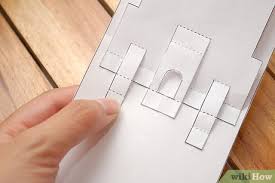 Pinch two cards into a triangle and place them with the pointy side up onto the first base card. How To Make A Castle Pop Up Card Robert Sabuda Method
