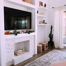 Once your faux fireplace is in place, it's time to customize it. Faux Fireplace Ideas For An Extra Cozy Home