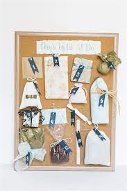 Filled with goodies, tissues, wedding mints, emery boards, bride tank top,, lipstick case, hand creams, notepad, pen, showers scrunchie, chapstick, etc. How To Diy A Wedding Advent Calendar Perfect Wedding Gift For Bride