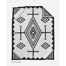 This blanket's artwork in blanket is sure to impress your guests just as much as it keeps you comfy at night. Los Ojos Blanket Pendleton