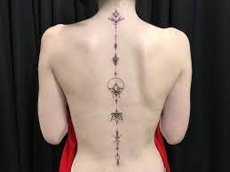 Lotus Spine Tattoo On Ecaterina Annatat Annatattoo Lotustattoo Lineworktattoo Spinetattoo Femeninetat Spine Tattoos For Women Elegant Tattoos Back Tattoo
