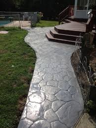 You may be able to manage pouring and placing the concrete with minimal issues, but if you don't get the imprinting process just right, you'll be left with a permanent slab that can be difficult and expensive to repair. Concrete Walkways Chadds Ford Difelice Stamped Concrete