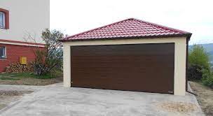 Eine garage ist eine abschließbare, überdachte und durch wände umschlossene abstellmöglichkeit für fahrzeuge, meist pkws. Deine Fertiggaragen Doppelgarage Mit Walmdach