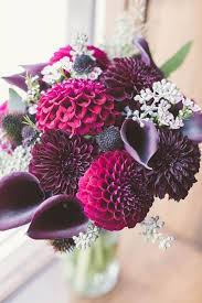 The dahlia flower is known to be one of the most beautiful flowers in the world. Image Result For Wedding Bouquet To Go With Sangria Colour Scheme Purple Wedding Bouquets Purple Bridal Bouquet Dahlias Wedding