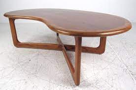 These kidney shaped coffee table are offered in various shapes and sizes ranging from trendy to classic ones. Vintage Walnut Kidney Shaped Coffee Table For Sale At 1stdibs