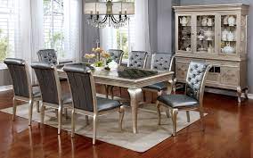 With a pair of stunning mirrored pillars serving as the table's base, this beautiful rectangular pedestal table doubles as a piece of. Dining Room Amina Champagne Rectangular Table With Chairs Golden Woods Furniture