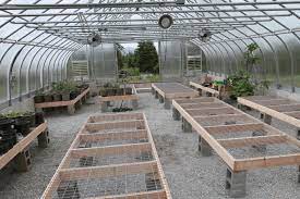 A cool traditional greenhouse table entirely made of wood with a natural stained finish. Pin On Hobby Farming