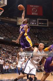 The nets compete in the national basketball association (nba). Kobe Bryant Of The Los Angeles Lakers Dunks Against The New Jersey Kobe Bryant Pictures Kobe Bryant Dunk Kobe Bryant Poster