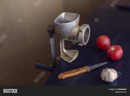 Manual vintage meat grinder and ripe tomatoes on the table. Manual Vintage Meat Image Photo Free Trial Bigstock