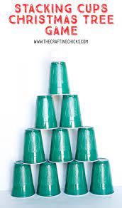 Stacking Cups Christmas Tree Game Christmas Tree Game Christmas Party Games Preschool Christmas Party