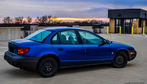 Image result for Bright Red 2000 Saturn