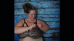 Busty Youtuber trying different bras on her fat tits