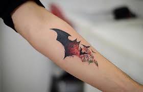 Whether you are planning to book your tattoo appointment soon or just getting ideas this list of 101 tattoos will help you choose. Batman Symbol Tattoos Batman Joker Tattoo Batman Tattoo
