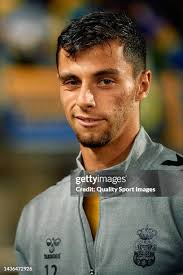 Alvaro Jimenez of UD Las Palmas competes for the ball with Quini... News  Photo