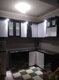 Gambar lemari dapur kayu jati minimalis sumber rebanas.com. Perpaduan Warna With Black Glossy Kitchen Set Minimalis Facebook