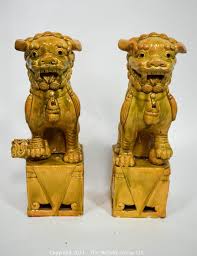 Foo dog or fu dog may refer to: The Mcguire Group Llc Auction 112 Session 2 Crystal Porcelain Ceramics Sterling Electronics Furniture And More Item Pair Of Heavy O A I Oriental Arts Hong Kong Yellow Glazed Ironstone Foo Dogs Some Wear