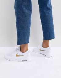 Gizeh flat sandal in white £ 24. Nike Air Max Thea Trainers In White And Gold Asos