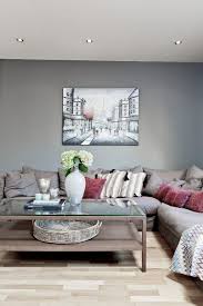 Wohnzimmer Modern Gestalten Graue Wandfarbe Taupe Ecksofa Couchtisch Glasplatte Wandbild Wohnzimmer Einrichten Wohnzimmer Dekor Modern Wohnzimmer Modern