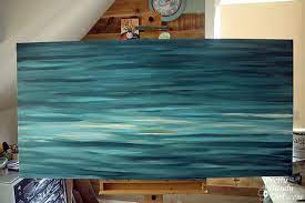 Begin by painting a nice gradient of paint on the canvas. Diy A Giant Artist Canvas Pretty Handy Girl