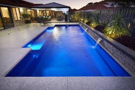 Decorative Concrete Pool Surrounds Options Add Value With Liquid Limestone And Exposed Swimming Pool Landscaping Swimming Pools Backyard Pool Landscape Design