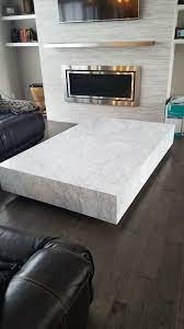 This elegant table in its simplicity has a marble piece on top and wheels. Cocktail Coffee Tables Coffee Table Marble Coffee Table Restoration Hardware