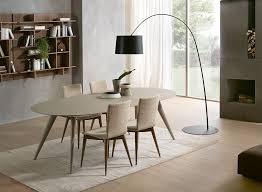 The Elegance Dining Table Is A Round Extendable Table With Legs In Solid Ash That Ex Round Extendable Dining Table Wooden Dining Tables Extendable Dining Table