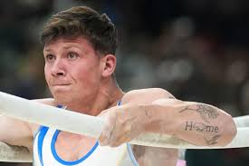 Zou wins men's parallel bars as China mounts gymnastics comeback