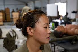 Spc. Goeun Crabtree, a combat medic assigned to the