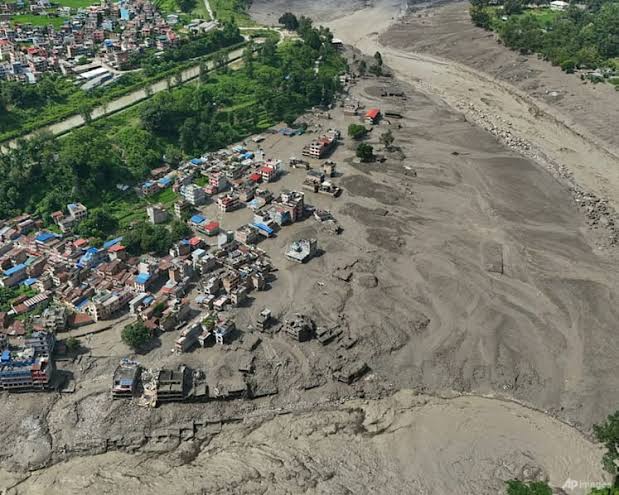 Flash flood on Nepal-Tibet border kills at least 19, leaves over 380 missing including tourists; Tibet's Gyirong suffers 'major casualties'